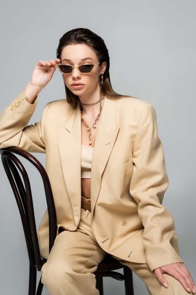 young-woman-in-stylish-beige-outfit-and-trendy-sun-2ACYSEN-800x1000